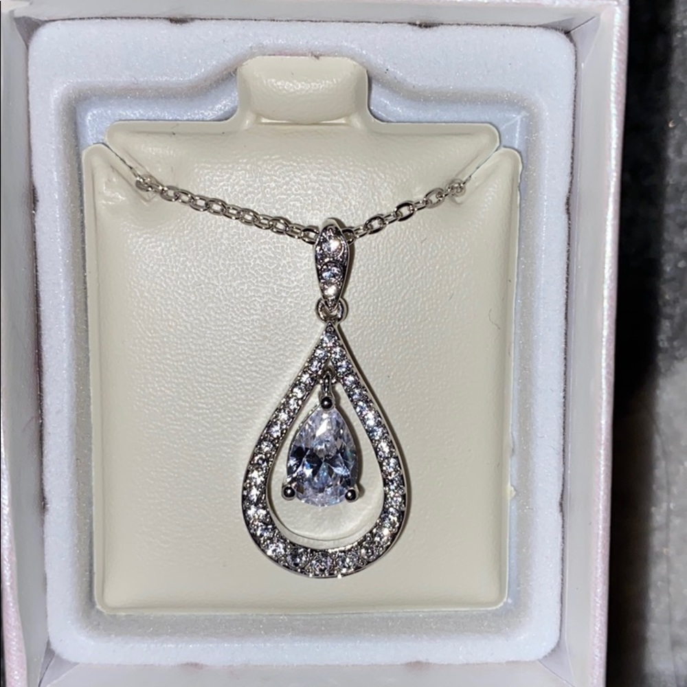 Piercing pagoda pear shaped necklace